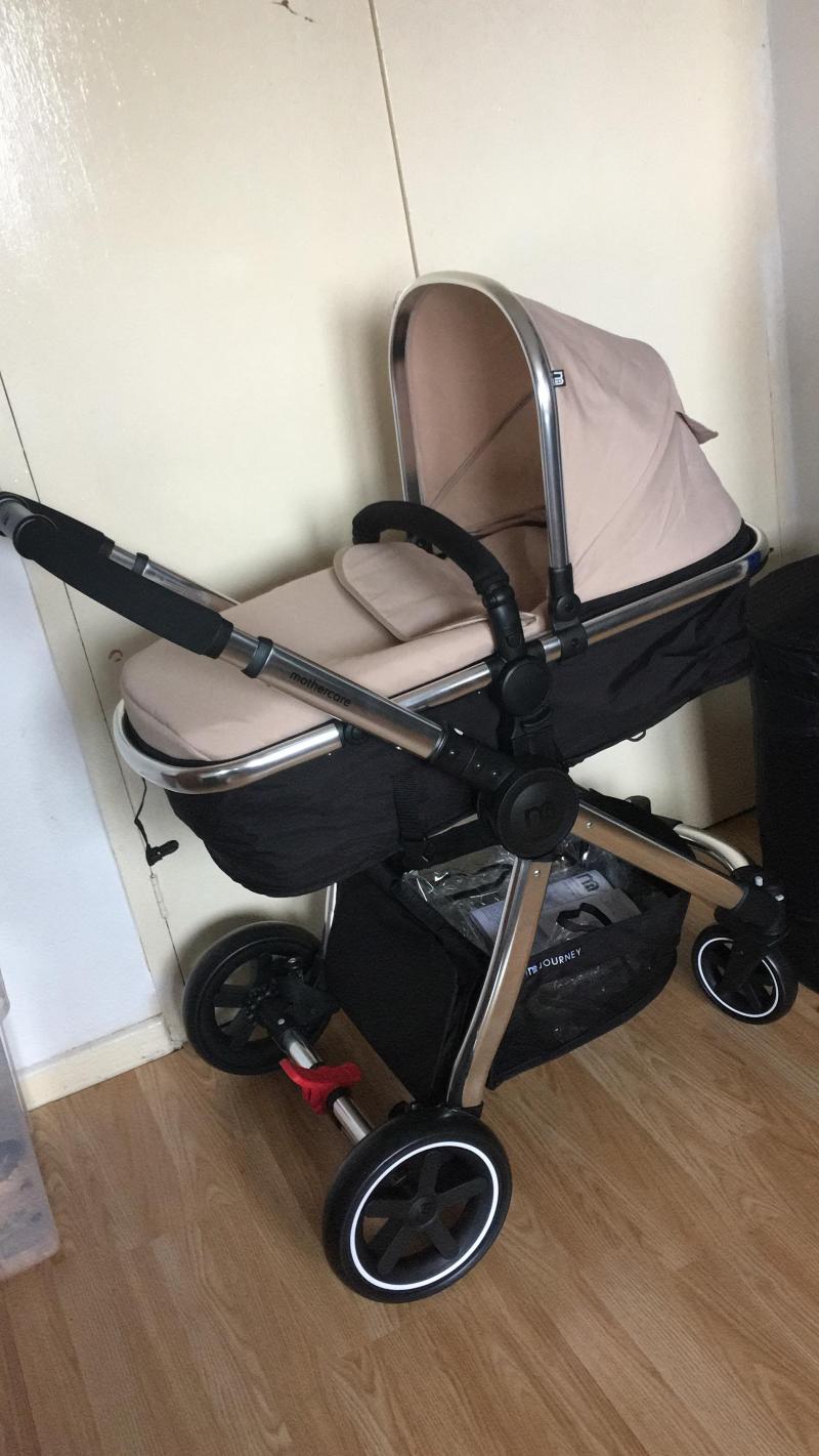 mothercare 4 wheel journey blush